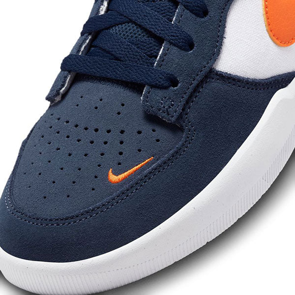 Nike navy blue and orange shoes Clearance